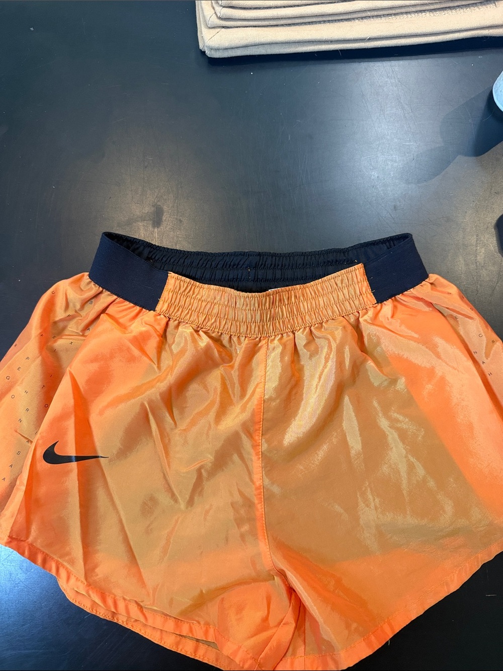 Nike Orange Athletic Shorts with Black Waistband and liner shorts